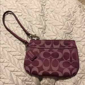 Purple coach wristlet